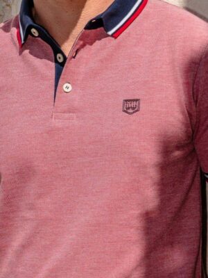 Scott Ellis branding on pique polo in red